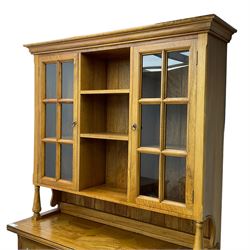 Barker & Stonehouse - flagstone dresser, raised display cabinets and shelves over three drawers and three cupboards, on turned feet 