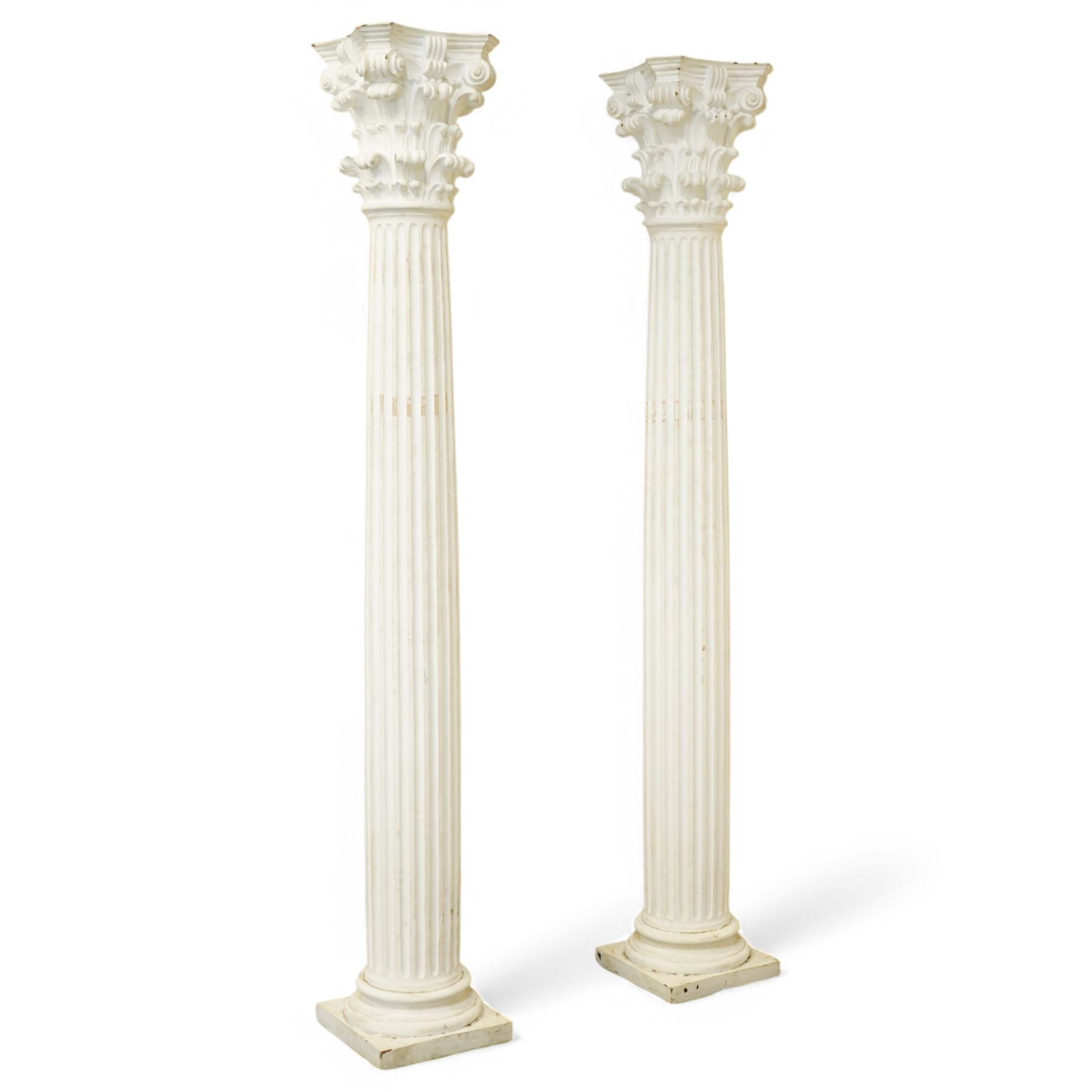 Pair of cast composite Corinthian architectural columns, the Corinthian capital decorated with scrolls and curled acanthus leaves, bulbous fluted shaft on moulded foot and square base 
