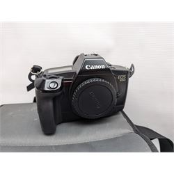 Canon EOS 650 camera, serial no 2122736, in carry case with some accessories, together with an Olympus XA2 camera and ten Kodak Instamatic cameras and two similar