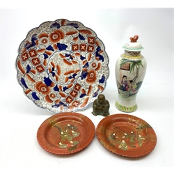  Chinese Republic period Meiping form vase and cover painted in polychrome enamels with figures (a/f), two Chinese red lacquer papier mache plates, small figure of Buddha and a Japanese Imari plate (5)  