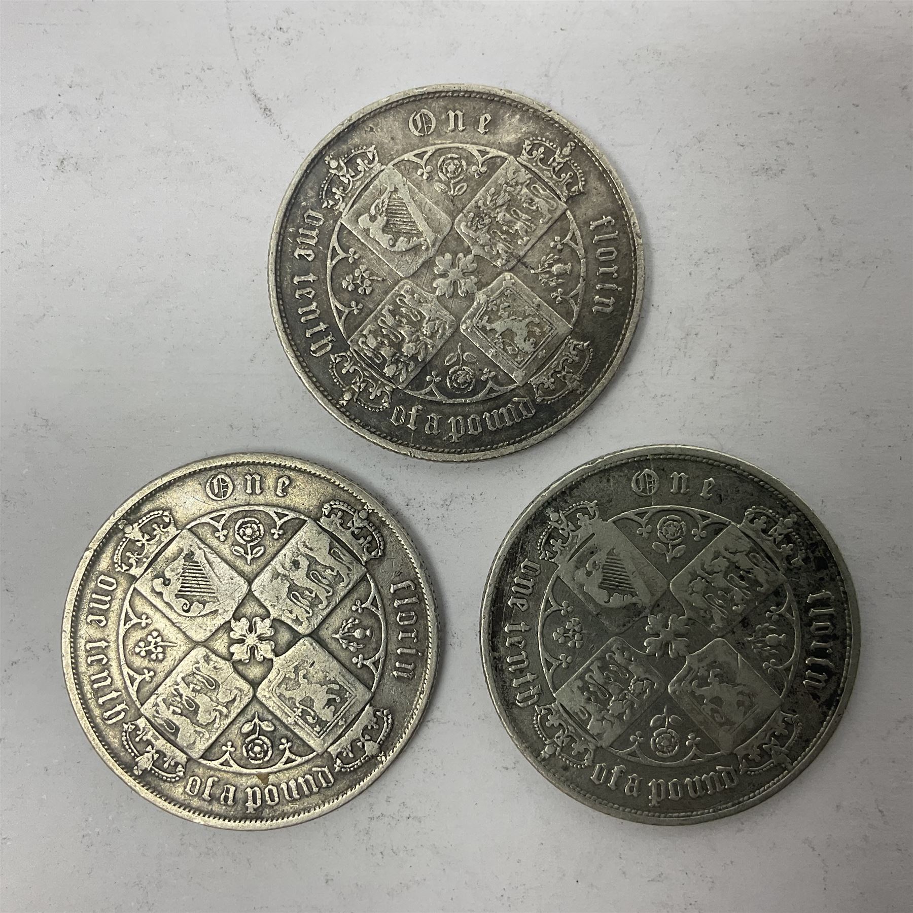 Three Queen Victoria silver 'Gothic' florin coins, dated two 1853 and 1873