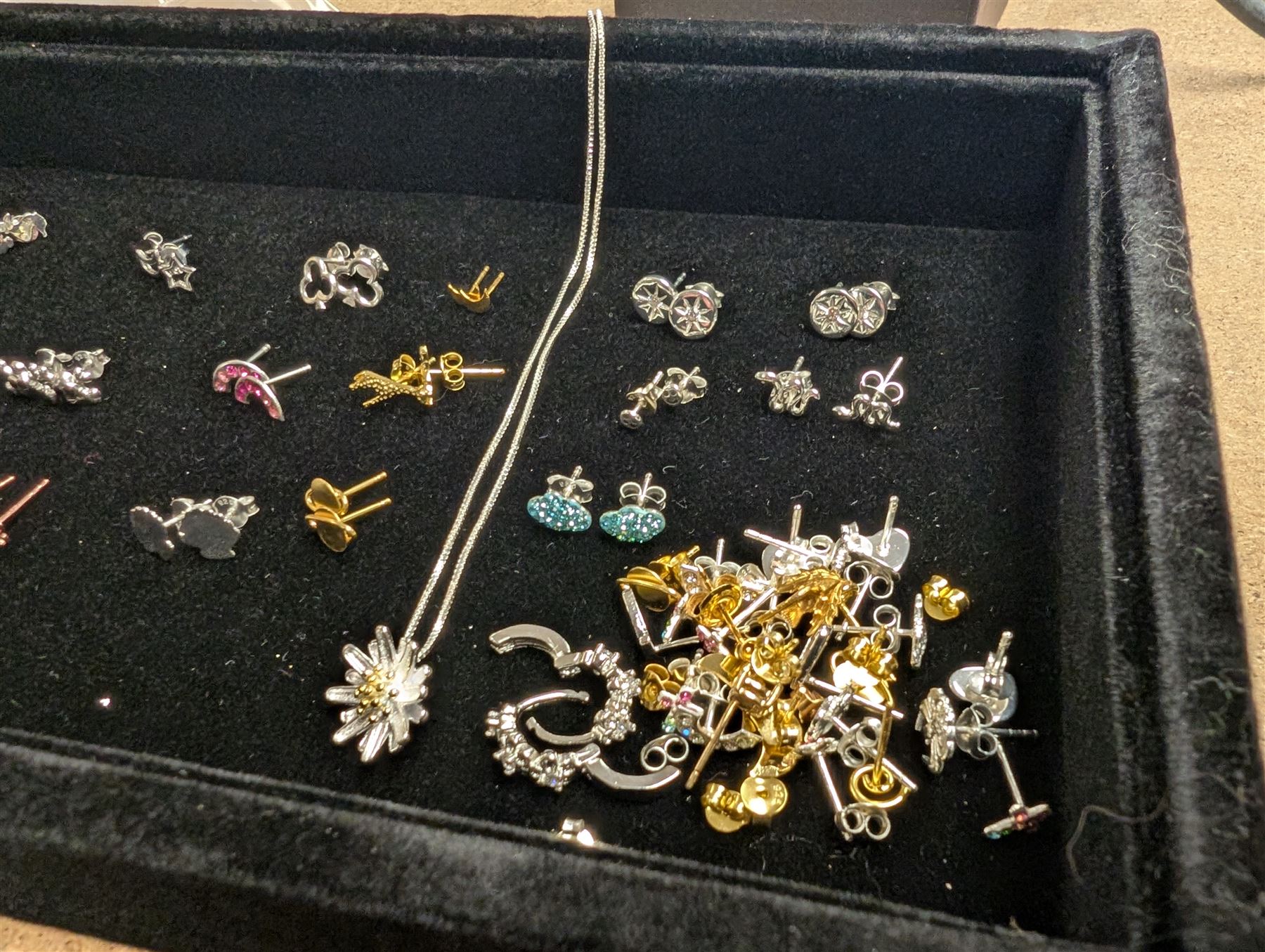 Group of silver earrings, including rainbows, clouds, skulls, crosses, etc, stamped 925