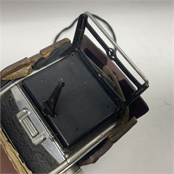 Franke & Heidecke Rolleicord twin lens camera, serial number 012706 with Heidoscop-Anastigmat f=7.5cm' lens and a 'Carl Zeiss Jena Triotar 1:4.5 f=7.5cm' lens, serial no 1474898, together with three similar cameras, including SEM TLR, serial no 420218, Ising Pucky box and Ferrania Elioflex, three in leather carry cases