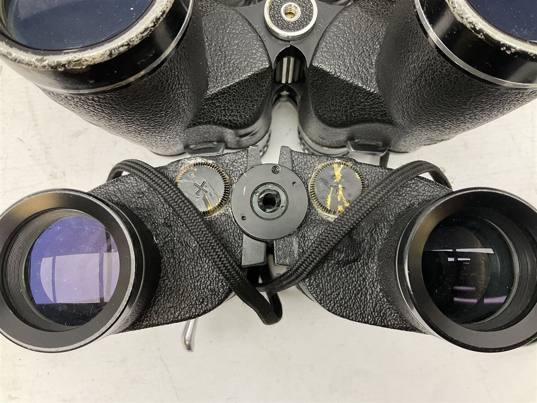 Eleven cased pairs of binoculars, to include Omiya 8x30, Tasco, Esde-Optik 8x40 Weitwinkel, Chinon 10x50 Field. Aico Rapide 8x30, Astralite zoom 6x- 14x32, etc