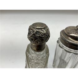 Edwardian silver mounted purse, with circular panel engraved with initials, and hammered finish, hallmarked William Comyns & Sons, London 1903, H14cm, together with three dressing table glass jars with hallmarked silver covers, and a hallmarked silver mounted buffer 