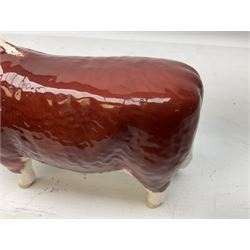 Three Beswick models comprising Hereford Bull no 949, 'CH Cutmil Cupie' Pug, and bay Shire horse, all with printed marks beneath
