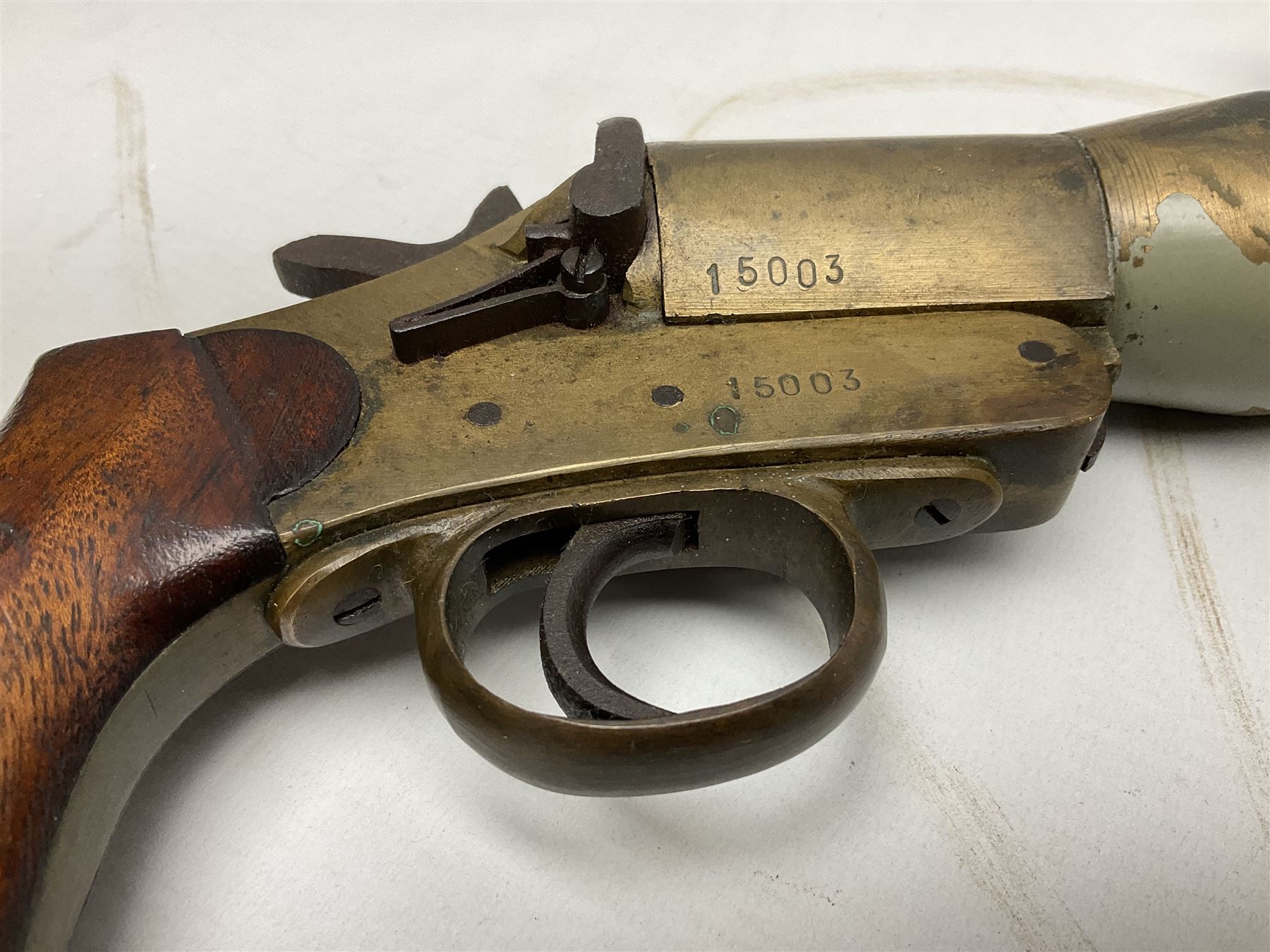 Schermulys Patent No.503324 nitro proof line throwing pistol No.15003; brass body with proof marks; the 32cm steel barrel with secondary handle over and original transfer 'The Schermuly Pistol Rocket Apparatus Ltd. London' L51cm overall