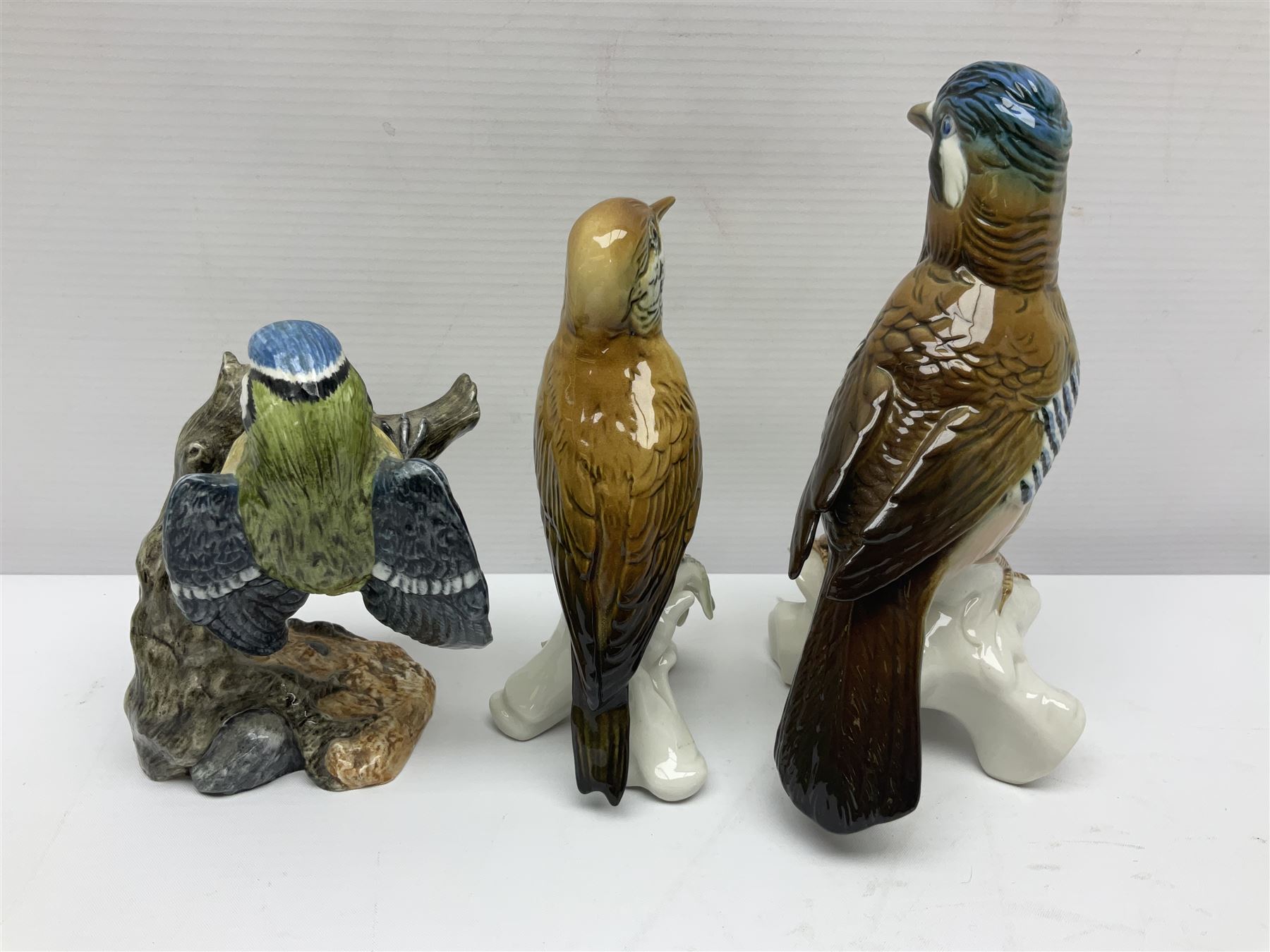 Eight Karl Ens bird figures, together with Mack blue tit and one other