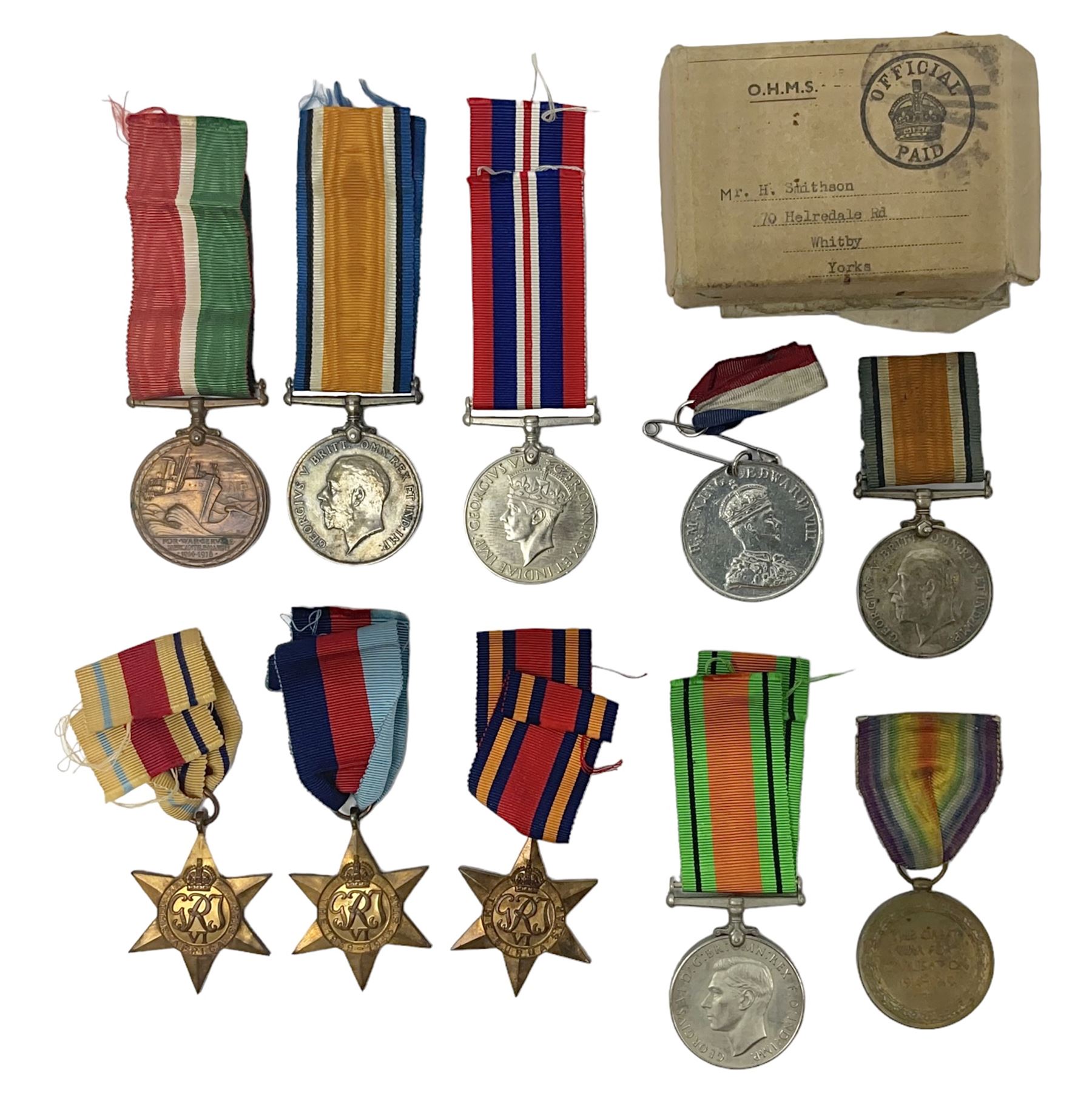 WW1 pair of medals comprising British war medal and Victory Medal awarded to 19774 Pte. G. Headlam Sea. Highrs.; another WW1 pair of medals comprising British War Medal and Mercantile Marine Medal awarded to Charles Filburn; WW2 group of five medals comprising 1939-45 War Medal, Defence Medal, 1939-45 Star, Africa Star and Burma Star; in issue box addressed to Mr. H, Smithson with medal slip; all with ribbons; and Edward VIII Coronation medal (10)