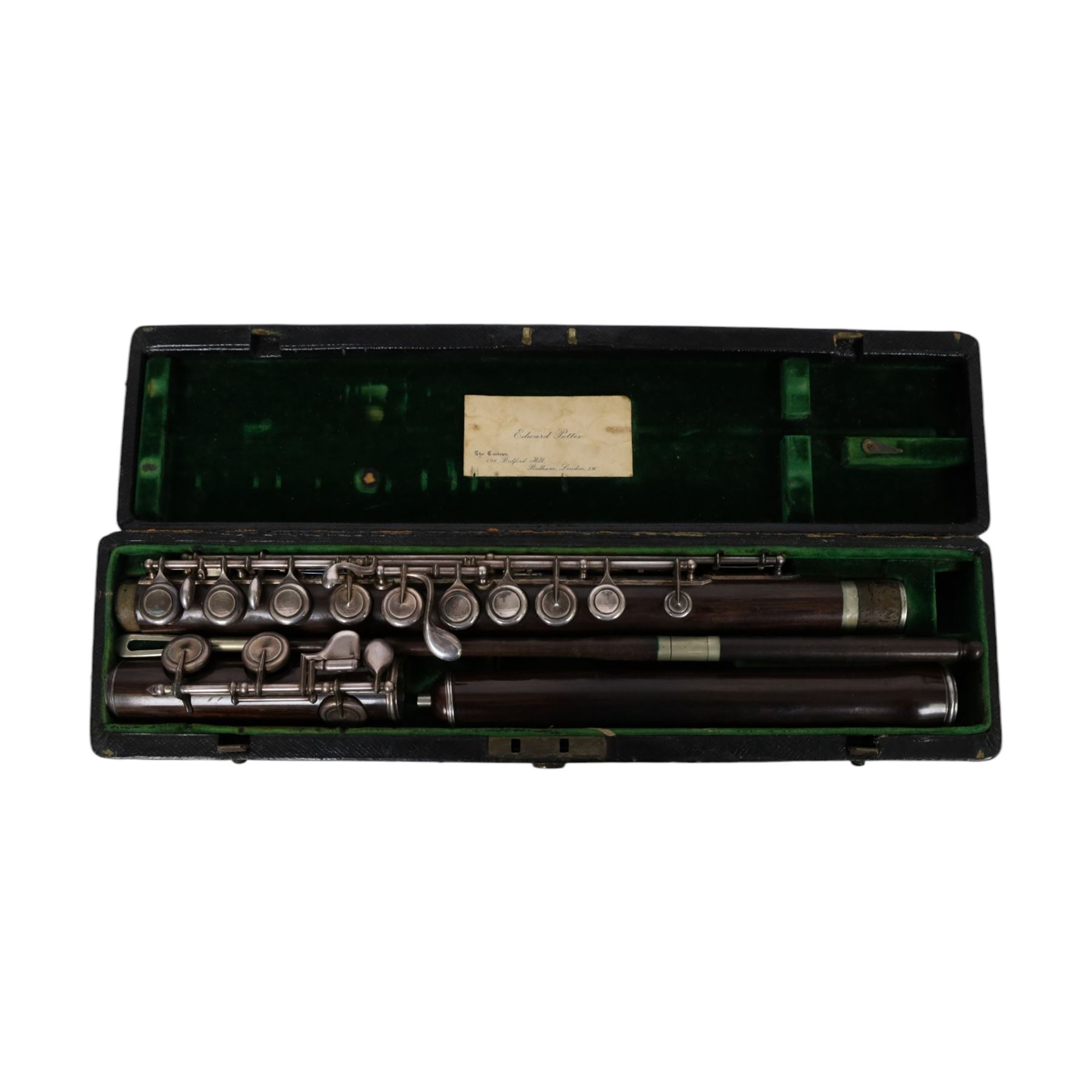 Early 20th century rosewood clarinet by Geo. Potter & Co Aldershot, together with a flute in fitted case, the lid with label reading Edward Potter
