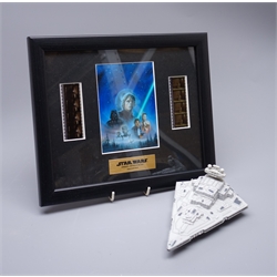  Star Wars - Episode VI Return of the Jedi, original double filmcell framed with a colour print of the main characters and certificate of authenticity from Rye By Post Ltd., 23 x 29cm, boxed, and an unboxed Kenner model of an Imperial Star Destroyer (2)  