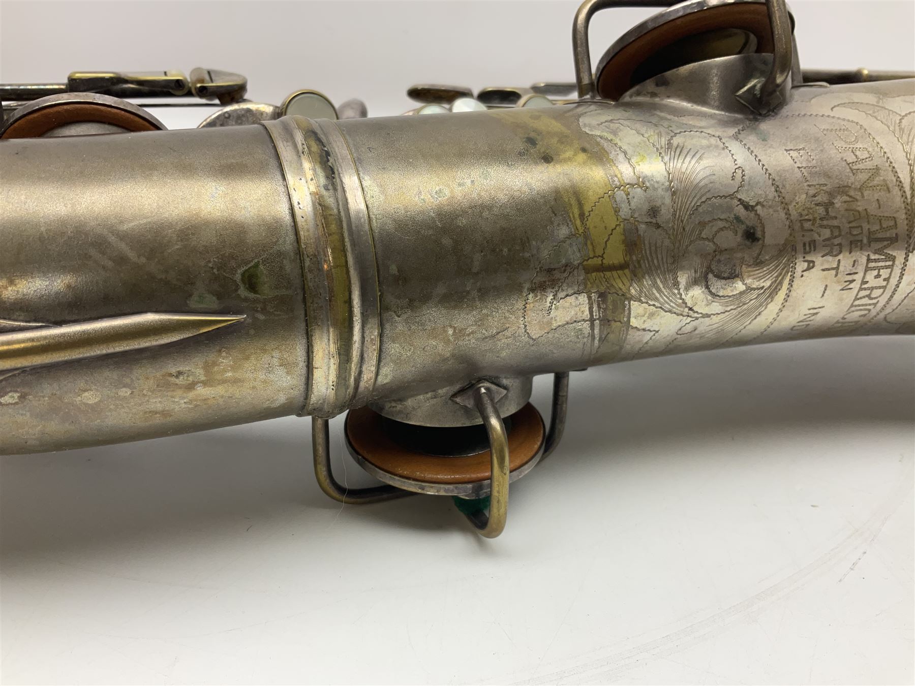 Early 20th century Elkhart Pan American C-Melody saxophone, Patd. Sept.14 1915, no.1153489, serial no.P27678; in fitted hard carrying case with crook