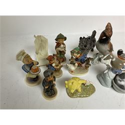 Group of figures to include Goebel Hummel, Royal Doulton Pyroeis and Winnie the Pooh, Lladro etc