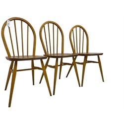 Ercol - set of three 'Windsor' elm and beech stick back chairs