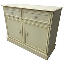 20th century cream painted side cabinet or sideboard, fitted with two drawers over two cupboards, on skirted base