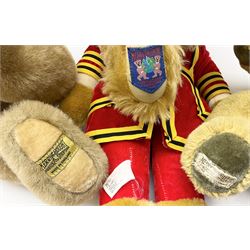 Four Merrythought teddy bears - International Collectors Club limited edition with growler mechanism No.71; plain brown with back-wind musical movement; golden brown dressed as a Beefeater; and earlier light golden coloured (4)