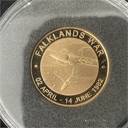 'The Falklands War 1982 2022' gold 1/4oz commemorative trio, each medallion being 7.98 grams of 22ct gold, cased with certificate 