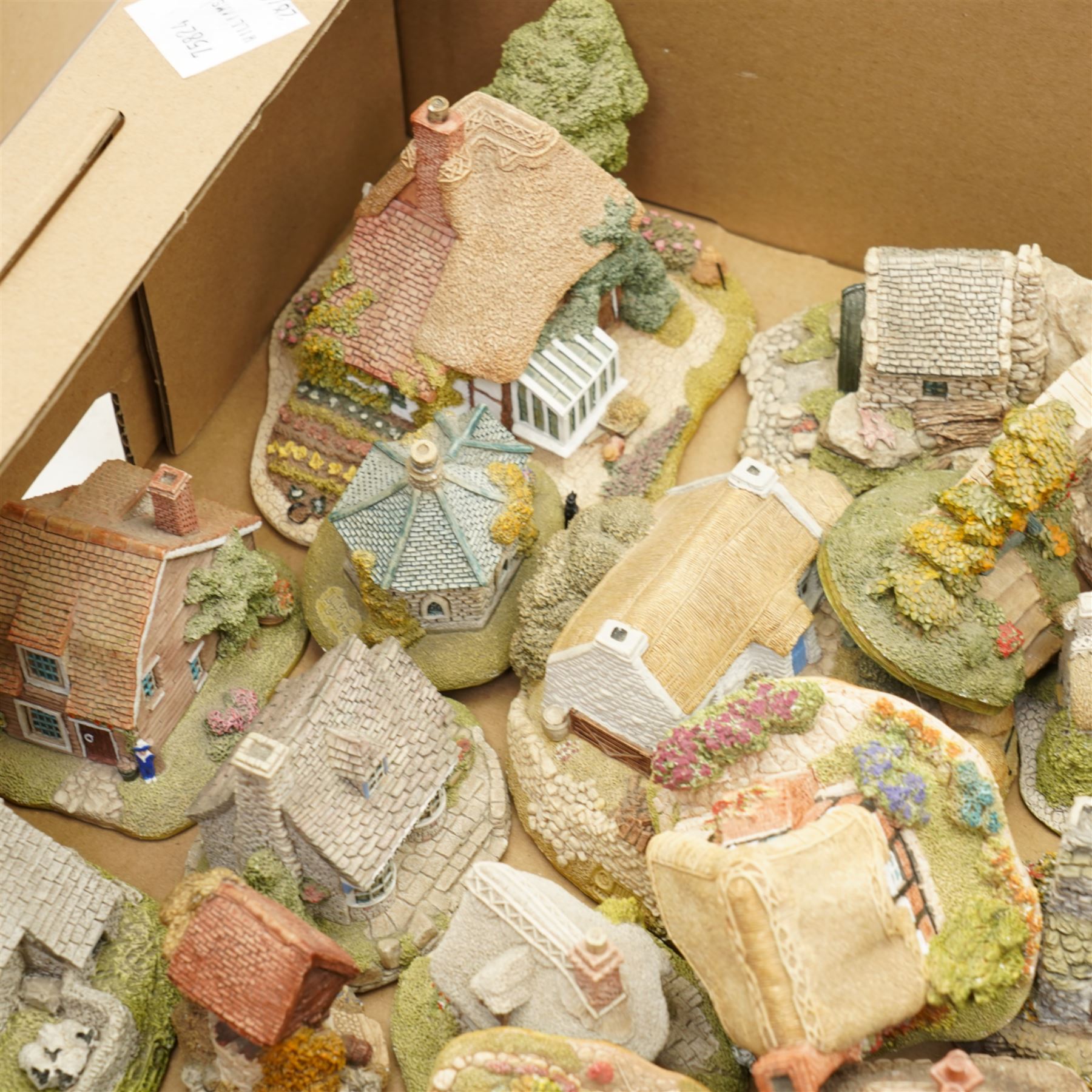 Thirty five Lilliput Lane model cottages, to include 'Shropshire Cottage' 'Milestone Cottage' 'Cosy Corner' etc