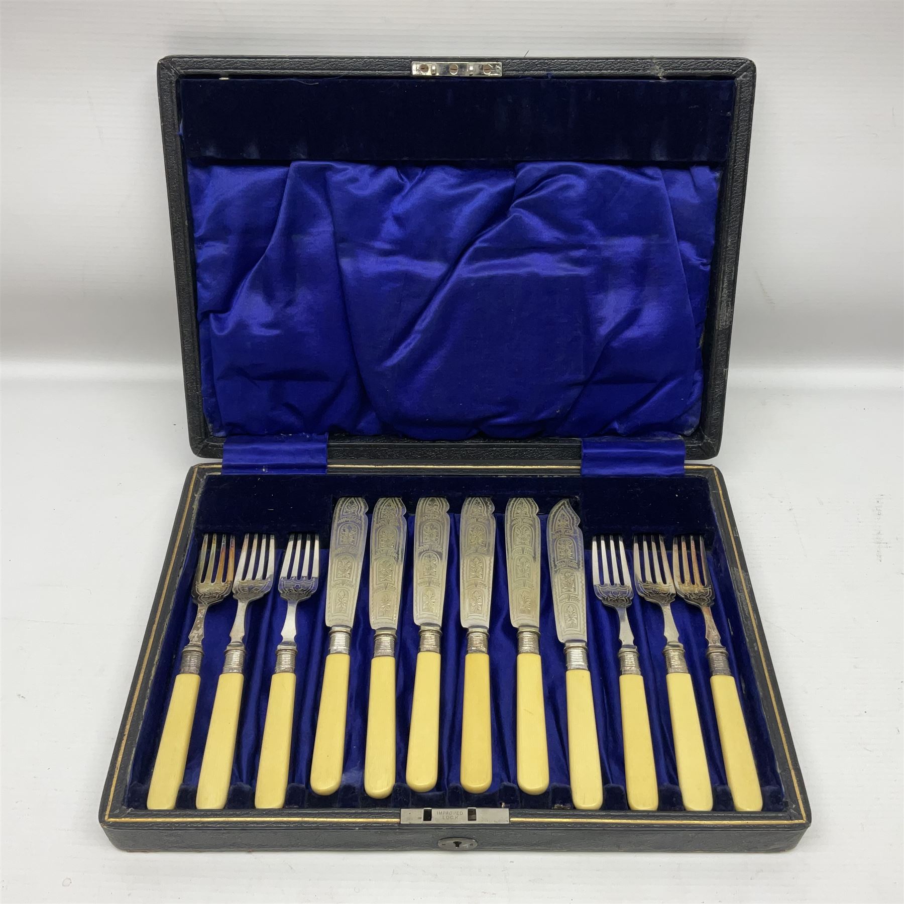 Set of six EPNS fish knives and forks with ivorine handles and hallmarked silver ferrules, boxed, together with a tapering glass decanter with hallmarked silver collar and pair of cut glass salts with hallmarked silver collars, decanter H32cm