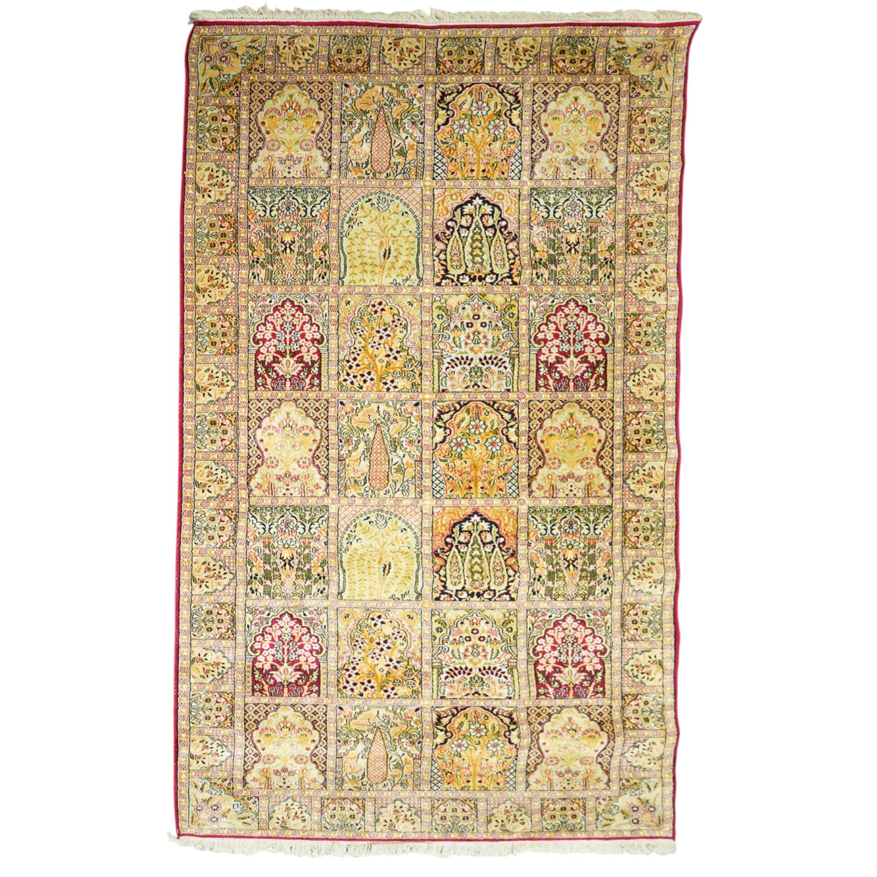 Late 20th-century Persian panel design silk and cotton blend rug, in pale tones of ivory, pistachio, green, crimson, pale blue, and rose, each compartment enclosing a stylized mihrab, boteh, cypress, and floral motifs, framed by a narrow floral border with guard stripes and cotton fringe ends 