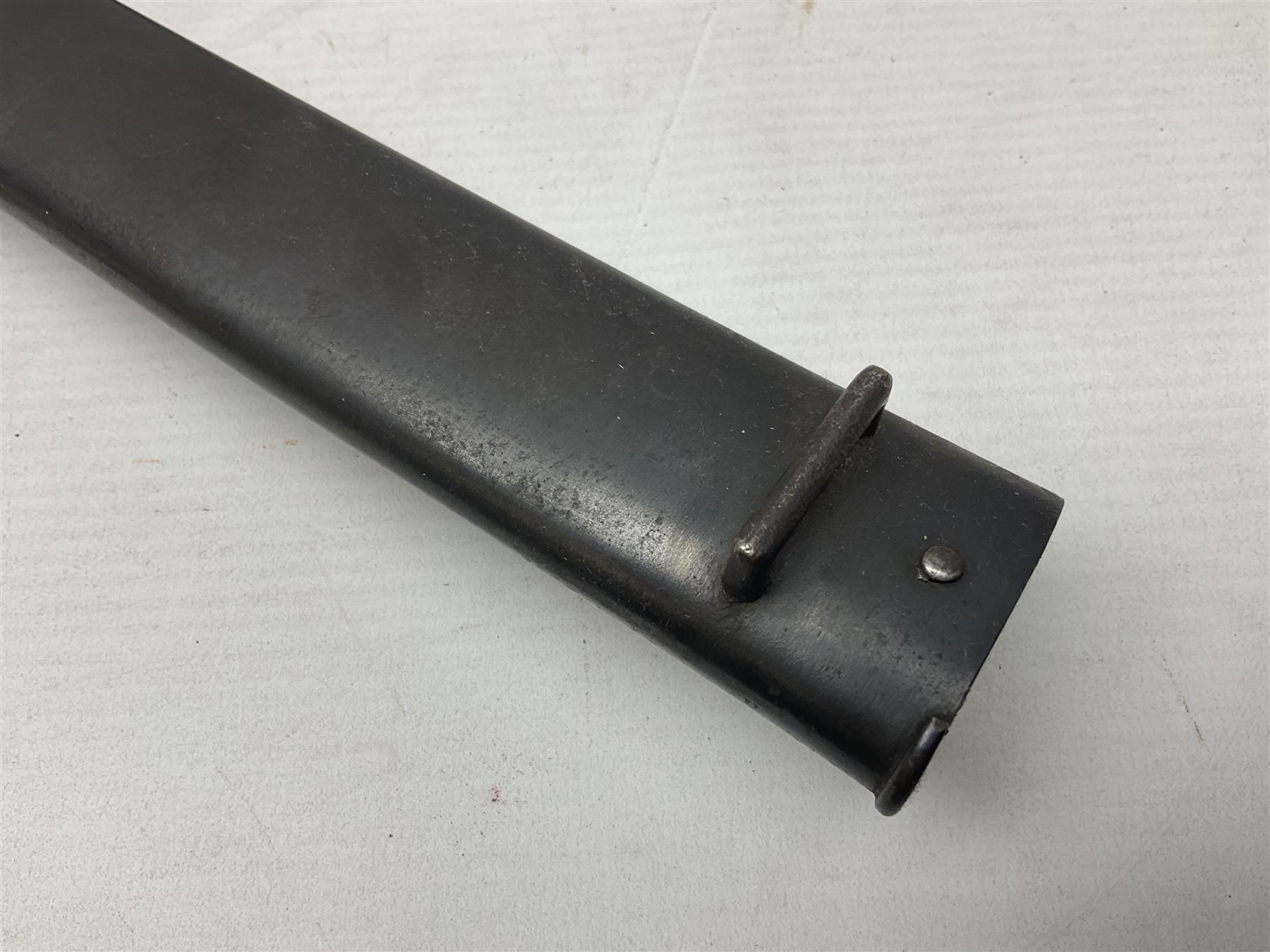 French Model 1866 Chassepot bayonet with 57cm curving fullered steel blade dated 1873 No.L63963; in steel scabbard with conforming number L71.5cm overall; and French St. Etienne Gras bayonet dated 1878 No.K10674 in steel scabbard numbered 79437 (2)