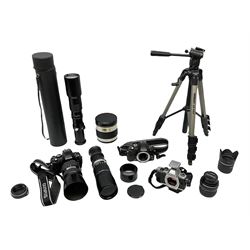 Three Olympus Camera bodies, comprising 