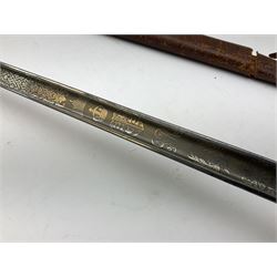 British George V 1897 Pattern Infantry Officers Sword, the 82.5cm fullered steel blade etched and polished with crowned royal arms, GRV cyphers and scrolling foliage, marked Army & Navy Co-operative Society 105 Victoria St London SW to the ricasso,  plated pierced basket hilt with wire bound fish skin grip and leather knot, No.15032; in leather covered scabbard