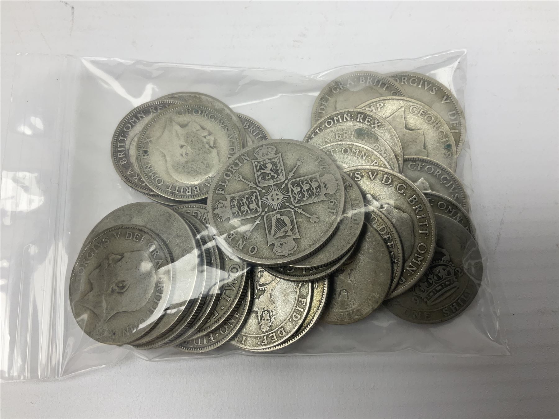 Approximately 200 grams of Great British pre 1947 silver coins including shillings, florins etc, pre-decimal pennies and other coinage