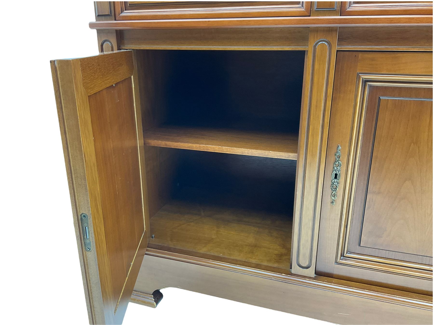 Contemporary cherry wood sideboard, rectangular moulded top over three drawers and three cupboards