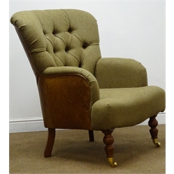  Victorian style high back armchair upholstered in Scottish wool tweed and tan leather on turned mahogany feet with brass castors, W75cm  