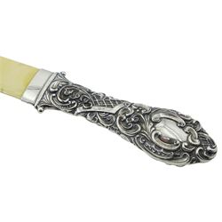 Victorian silver and ivory page turner, the repousse silver handle with foliate and C scroll decoration, hallmarked Crisford & Norris Ltd, Birmingham 1898, L35.5cm