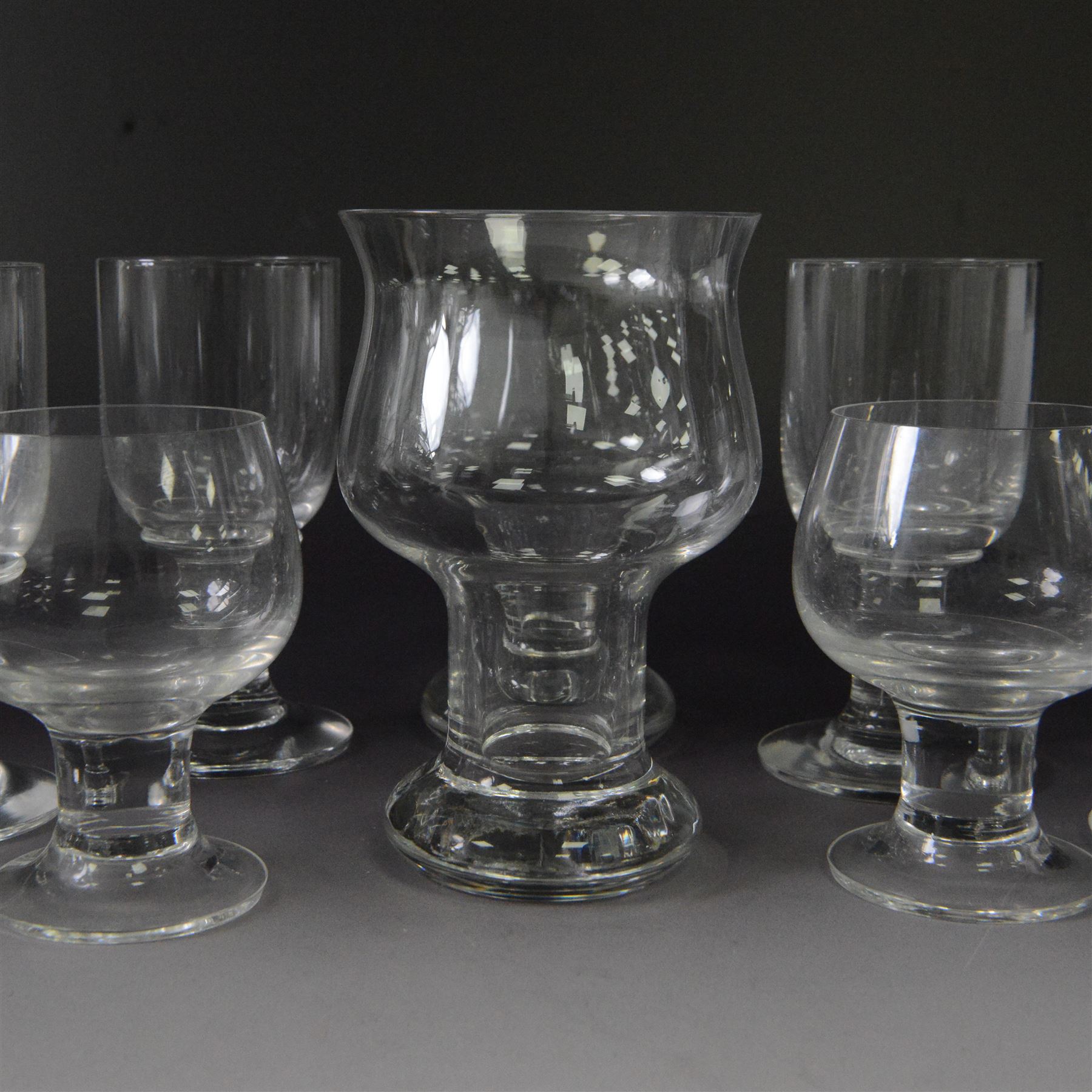 Dartington Crystal pieces designed by Frank Thrower, including claret glasses, Vin decanter, ale glasses and brandy glasses