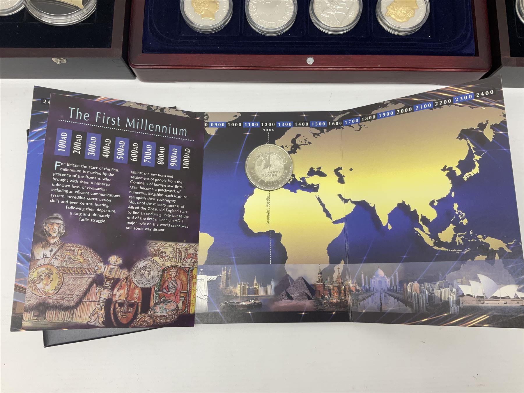 Single owner lifetime collection of mostly commemorative modern World coins with gold, silver and base metal examples, including two Queen Elizabeth II Bailiwick of Guernsey twenty-five pound gold coins 'The 1999 Royal Wedding' and '100th Anniversary of the End of the Victorian Era' 2001 each in 24 carat gold weighing 7.81 grams with certificates, silver coins commemorating the Millennium 2000 including Guyana sterling silver proof two-thousand dollars, Fiji sterling silver proof five dollars etc, silver coins from the Queen Elizabeth II Golden Jubilee Collection dated either 2002 or 2003 from Great Britain and the Commonwealth countries, United Kingdom commemorative crowns in card folders, The Royal Mint United Kingdom 1997 proof coin set in red folder without certificate etc