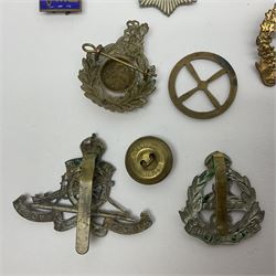 Over thirty WW1 and WW2 cap badges including Royal Marines, RASC, RAOC, Lancashire Fusiliers, York & Lancaster, RE, RA, East Yorkshire, Royal Berkshire, RAC, ATS, RAMC, West Yorkshire, Reconnaissance Corps etc; Services Rendered badge No.B143796; small quantity of shoulder titles, buttons etc