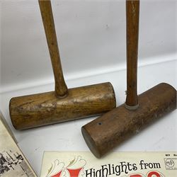 Two wooden croquet mallets together with cased records