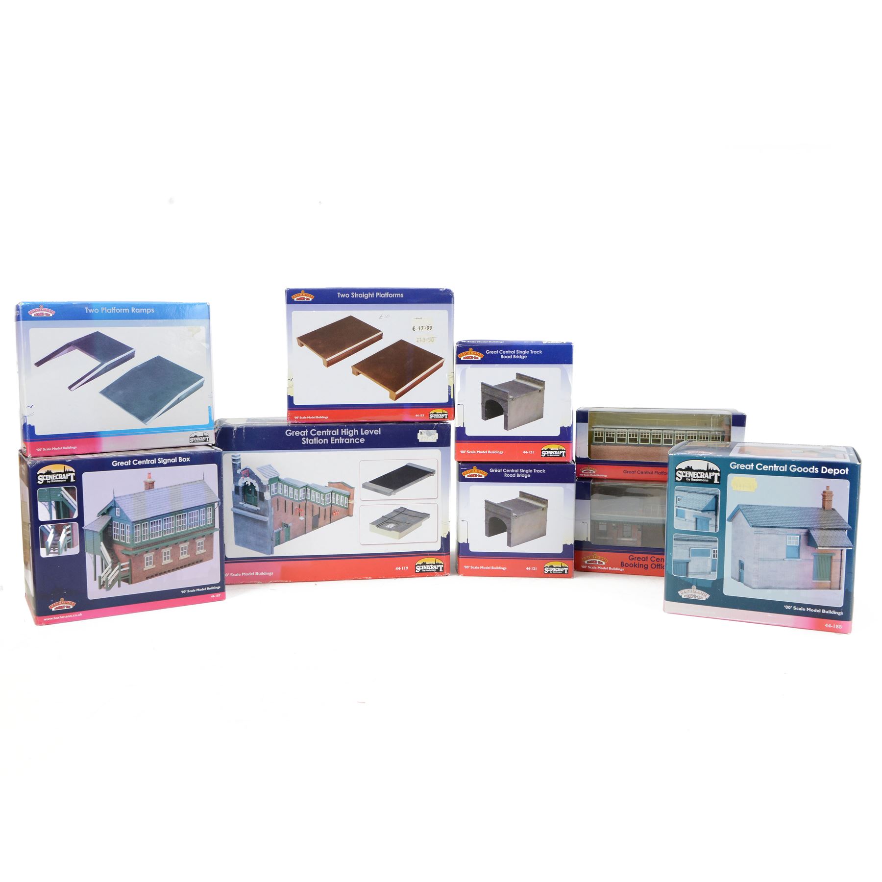 Nine Bachmann Scenecraft 00 gauge 'Great Central Station' model railway trackside buildings, comprising 44119 High Level Station Entrance, 44117 Booking Office & Canopy, 44187 Signal Box, 44188 Goods Depot, 44118 Platform Subway, two 44121 Single Track Road Bridges, 44153 Straight Platforms and 44154 Platform Ramps, all boxed 
