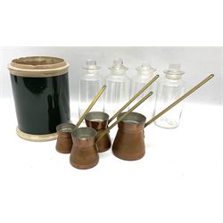 Set of four graduating copper ladles, together with various chemist jars 