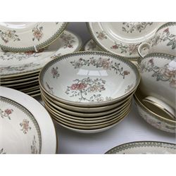 Minton Jasmine pattern tea and dinner wares, including dinner plates, sauce boats, side plates, bowls, teacups, coffee cans and twin handled soup bowls, etc (122)