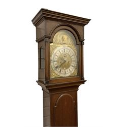 William Todd of Scarborough - early 18th century 8-day oak cased longcase clock c1730, with a flat top and deep cornice to the pediment, glazed side windows and a break arch hood door beneath with attached pilasters, long trunk door with an arched top on a reduced plinth with applied skirting, brass dial with cast spandrels and a father time automata to the arch, silvered chapter with Roman numerals and five minute Arabic's, quarter-hour and minute track,  plain dial centre with engraving and ringed winding holes, seconds dial and date aperture, movement pinned directly to an internal countwheel striking movement, striking the hours on a vertical bell. With pendulum and weights. 
William Todd is recorded as working in Scarborough 1720-d.1752..
