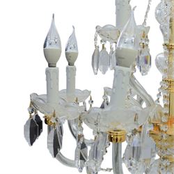 Late 20th century gilt brass and glass twelve branch chandelier, with glass swags and drops