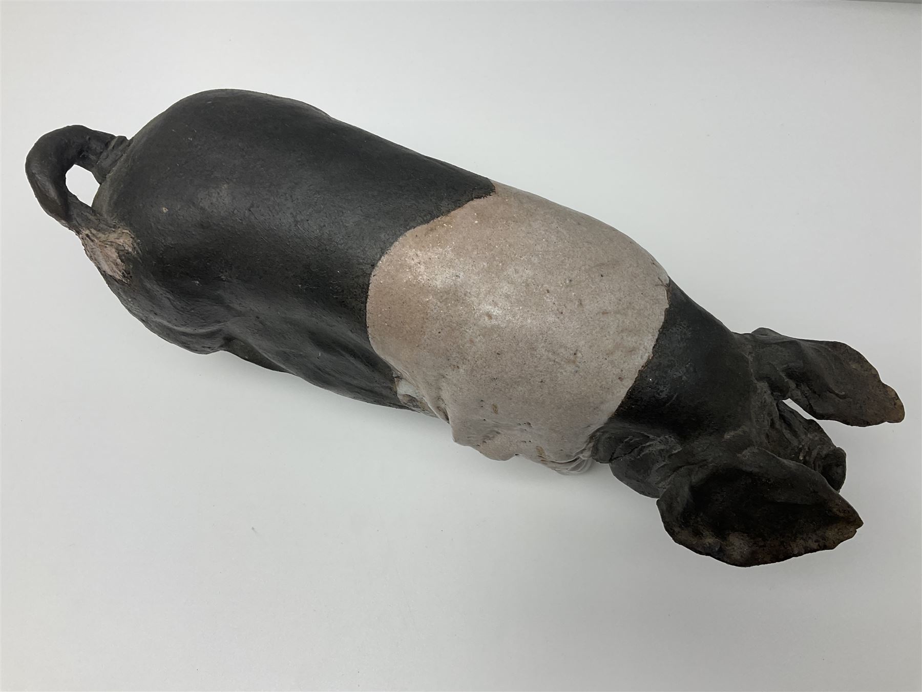 Studio pottery Saddleback pig, with artist signature beneath, H18cm, L39cm