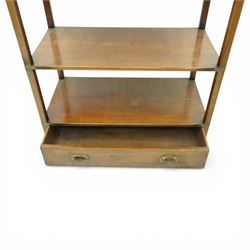 Late 20th century mahogany open bookcase, rectangular form with five open shelves and brass mounted corner brackets, fitted with single lower drawer with recessed brass campaign handles, on block feet