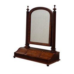  Early Victorian mahogany toilet mirror, arched plate on turned tapering supports with finials the base with three hinged lidded compartments on bun turned feet, H84cm, W69cm   