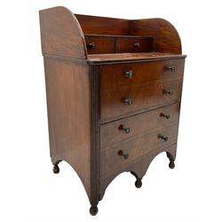19th century mahogany bedroom stand, the raised gallery back with two small drawers, the lower section fitted with two drawers, curved and reeded uprights, turned feet