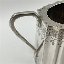 Victorian three-piece silver tea service, comprising teapot, twin handled open sucrier and milk jug, of oval form with shaped rim and C handles, each engraved with crests and bands of strapwork decoration, the milk jug and sucrier with gilt interiors, hallmarked Josiah Williams & Co, Exeter 1881, the teapot with ivory insulators and finial, all contained with a tooled leather, blue silk and velvet lined fitted case, retailed by West & Sun, Dublin 
This item has been registered for sale under Section 10 of the APHA Ivory Act