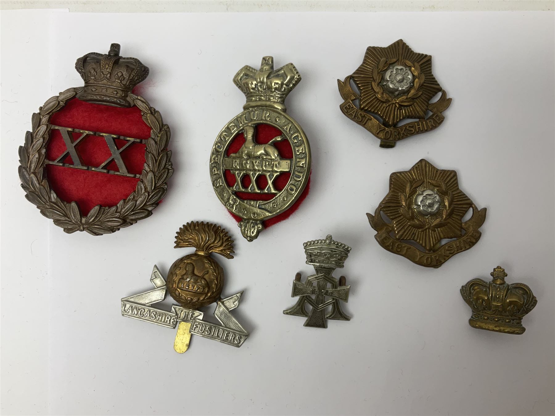 Over thirty regimental cap badges for fusiliers, Yorkshire interest, Light Infantry etc including Royal Scots and Welsh fusiliers, Durham L.I., KO Yorkshire L.I., Oxford & Bucks L.I., Green Howards, East Yorkshire, West Riding, York North Riding etc 