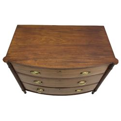 George III mahogany bow front chest, reeded and acanthus carved uprights, fitted with three drawers, turned and reeded tapering feet
