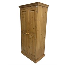 Solid pine double wardrobe, panelled doors