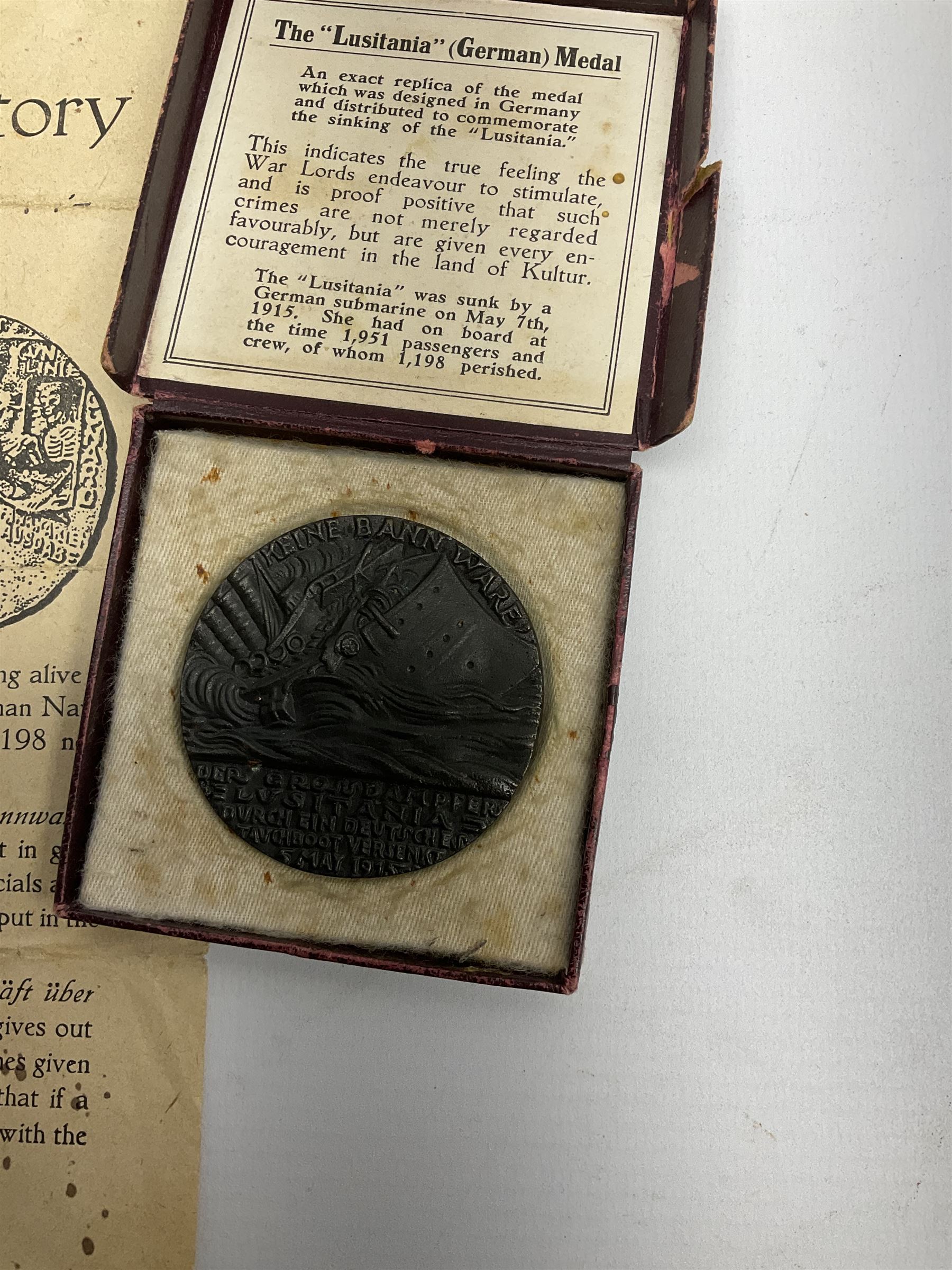 Lusitania replica medal, boxed and various coins including King George VI 1951 Festival of Britain crown, United States of America 1844 one cent and 1850 half dime, Queen Victoria States of Jersey 1844 one thirteenth of a shilling, etc