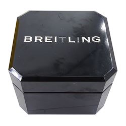 Breitling Old Navitimer gentleman's stainless steel automatic wristwatch, Ref. A13322 serial No. 517301, blue dial with date aperture,  silvered subsidiary dials at 6, 9 and 12 for seconds, 30 minute and 12 hour recording, bi-directional inner slide rule scale, on blue leather strap, boxed with papers and receipt dated 2002